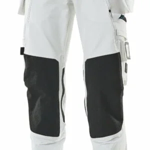 A pair of white work pants suitable for wearing with safety boots.