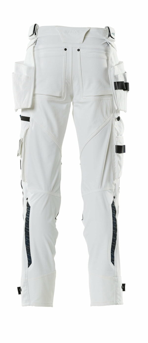 A pair of white work pants suitable for Ireland, with pockets for safety boots.