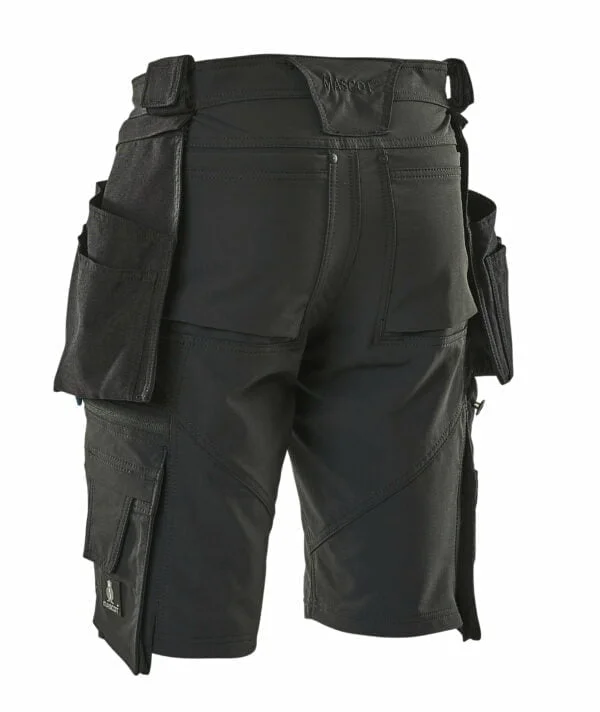 A pair of black work shorts suitable for Ireland, with pockets for practicality.
