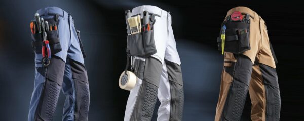 Four different types of workwear pants with tools on them.